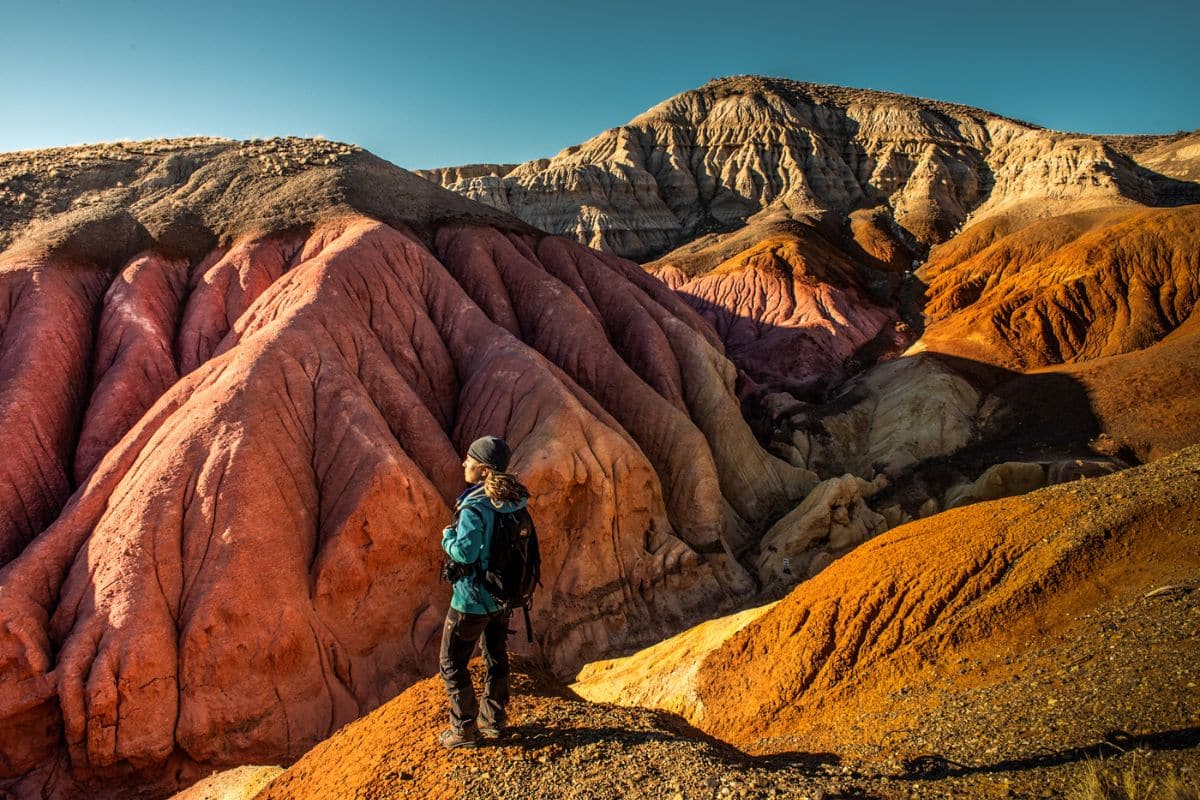 Hiker Enjoys the Tierra Del Colores Trail in the Cañadon Pinturas Secion of Patagonia National Park, Province of Santa Cruz, Argentina