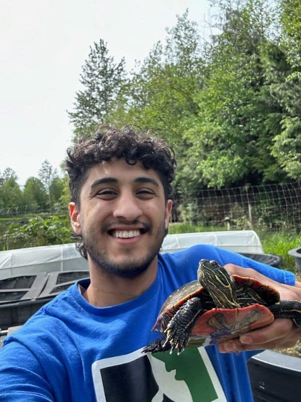 WPC Staff Holding Western Painted Turtle. Credits: WPC